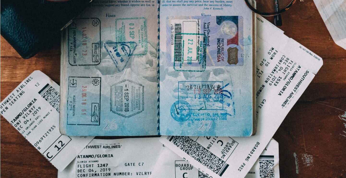 Passport plane tickets.